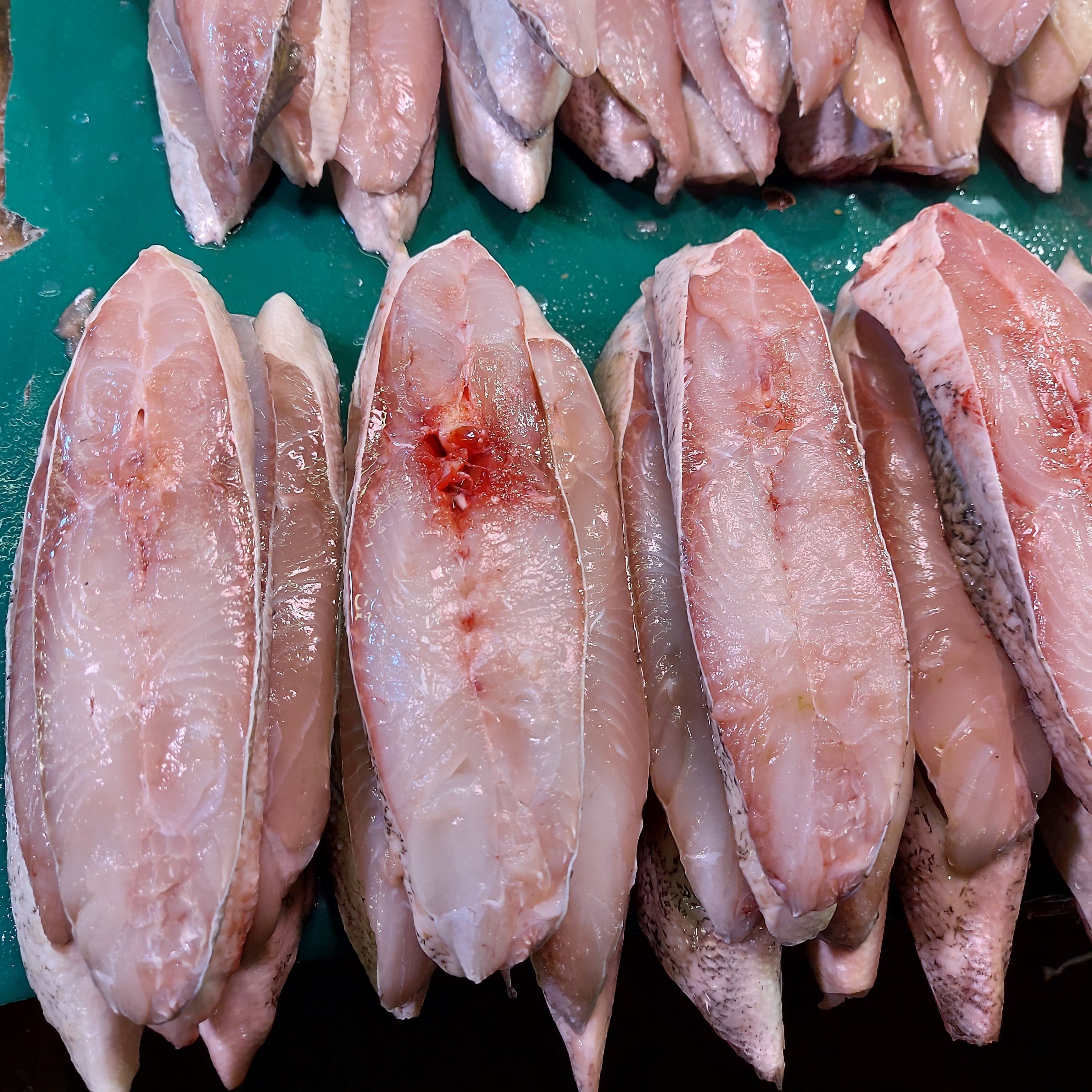 Freshly cut Maya Maya per Kilo Farm2Metro